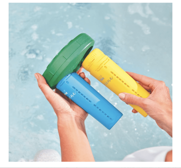 A person holding a FROG Serene Floating Sanitizing System for Hot Tubs, Quick and Easy Self-Regulating Hot Tub Sanitizer with Bromine and FROG Sanitizing Minerals Kills Bacteria 2 Ways, for Hot Tubs up to 600 gallons in the water.